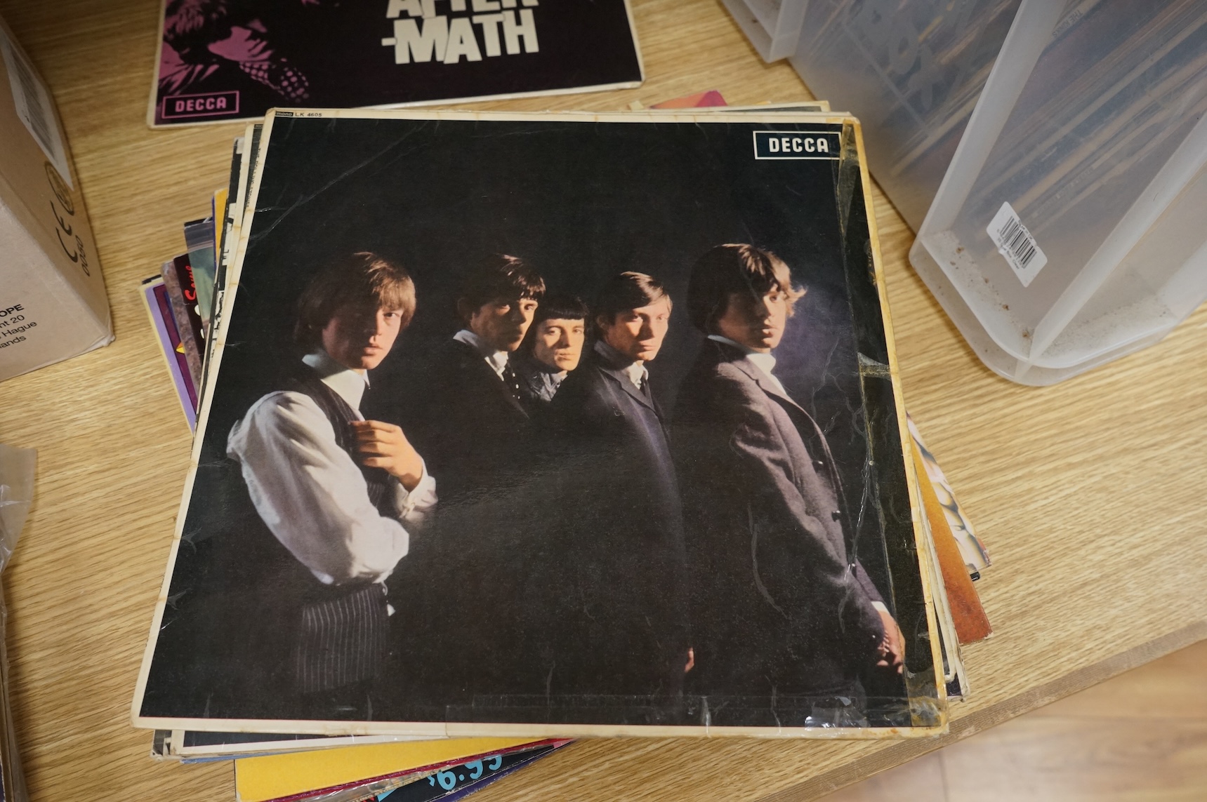 Eighteen The Rolling Stones related LP record albums, including five early pressings on Decca label; Rolling Stones, Rolling Stones No.2, Out of Our Heads, Aftermath, and Between the Buttons, together with; Exile on Main